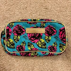 Betsy Johnson NWOT rose patterned makeup bag.